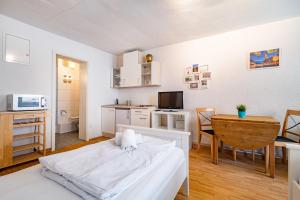 Kuchyň nebo kuchyňský kout v ubytování StayInn Apartments City Center