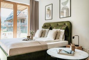 Ένα ή περισσότερα κρεβάτια σε δωμάτιο στο Polana Resort - LoftAffair Collection