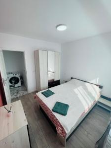 Ένα ή περισσότερα κρεβάτια σε δωμάτιο στο Apartament Gloria