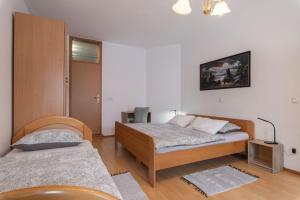 Letto o letti in una camera di Apartments Natura
