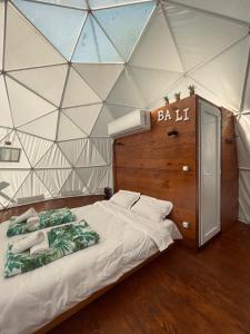 Postel nebo postele na pokoji v ubytování Bali Glamping