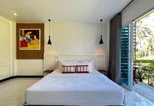 Postel nebo postele na pokoji v ubytování Koh Kood BED's
