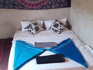 Postel nebo postele na pokoji v ubytování Guest House Nomad Life