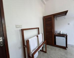 Katil atau katil-katil dalam bilik di Nico Beach Hotel