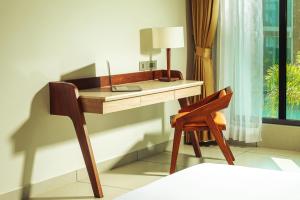 A bed or beds in a room at Elements by Rosetta