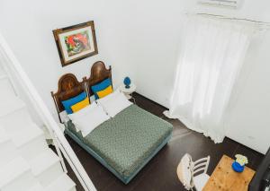 Postel nebo postele na pokoji v ubytování Boutique Hotel Molo S Lucia