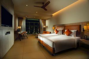 A bed or beds in a room at Elements by Rosetta
