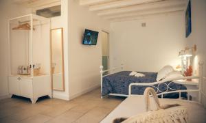 TV a/nebo společenská místnost v ubytování Boutique Hotel Molo S Lucia
