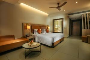 A bed or beds in a room at Elements by Rosetta
