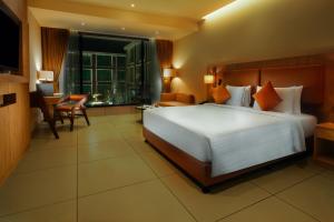 A bed or beds in a room at Elements by Rosetta