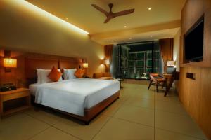 A bed or beds in a room at Elements by Rosetta