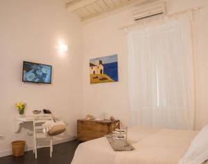 TV a/nebo společenská místnost v ubytování Boutique Hotel Molo S Lucia