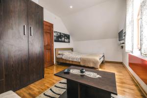 Katil atau katil-katil dalam bilik di Lodge Zeleni svet