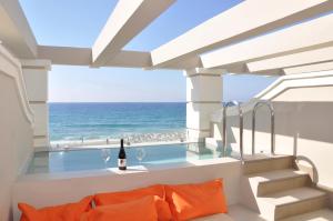 a room with a view of the ocean at Agios Gordios Beach Resort in Agios Gordios