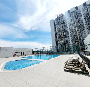 a swimming pool on the roof of a building at Malacca Spacious 3Bedroom Wifi Carpark in Malacca