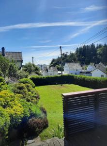 Zahrada ubytování Koselig leilighet i Skudeneshavn