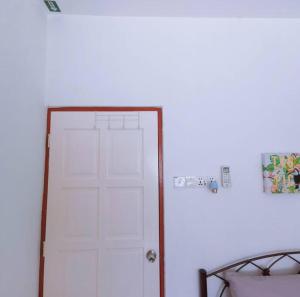 Postel nebo postele na pokoji v ubytování Gioia DeGarden