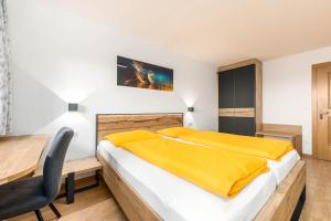 Posteľ alebo postele v izbe v ubytovaní Nussbaumerhof