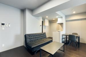 Χώρος καθιστικού στο Vacation Rental Hotel TENMONKAN