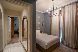 Posteľ alebo postele v izbe v ubytovaní Boutique Residence Villa Atouta-Lemon Spaces Maadi
