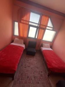 Postel nebo postele na pokoji v ubytování Taghadoute Hotel