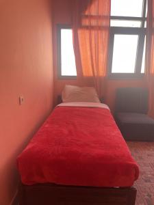 Postel nebo postele na pokoji v ubytování Taghadoute Hotel