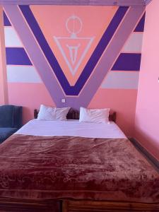 Postel nebo postele na pokoji v ubytování Taghadoute Hotel