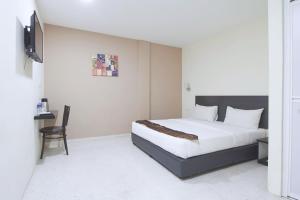 Voodi või voodid majutusasutuse M S Hotel, Tengku Kelana KTM Klang toas