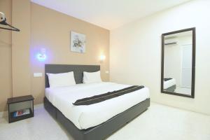 Voodi või voodid majutusasutuse M S Hotel, Tengku Kelana KTM Klang toas