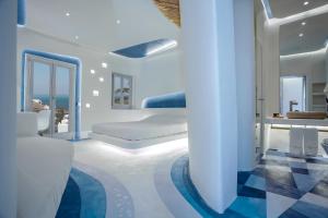 Postel nebo postele na pokoji v ubytování Andronikos Hotel + 37 fotografií