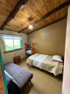 Postel nebo postele na pokoji v ubytování Cabañas Juan Jose