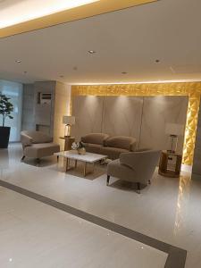 A seating area at Cozy Staycation at Destiny's Crib Fame, Edsa Mandaluyong