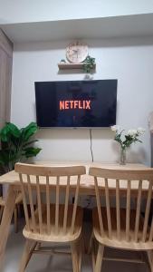 A television and/or entertainment centre at Cozy Staycation at Destiny's Crib Fame, Edsa Mandaluyong