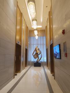 A television and/or entertainment centre at Cozy Staycation at Destiny's Crib Fame, Edsa Mandaluyong