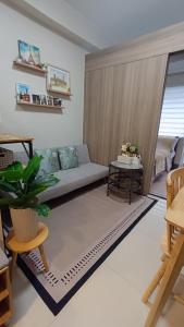 A seating area at Cozy Staycation at Destiny's Crib Fame, Edsa Mandaluyong