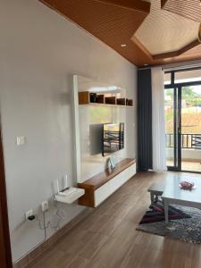 Μια τηλεόραση ή/και κέντρο ψυχαγωγίας στο PECA APARTMENt