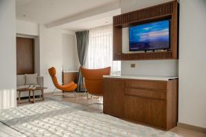 TV a/nebo společenská místnost v ubytování Hotel Drim & SPA