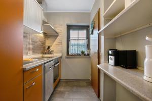 Kuchyň nebo kuchyňský kout v ubytování Ferienhaus Deichkönig