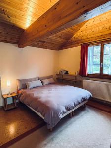 Postel nebo postele na pokoji v ubytování Chalet Gédéon