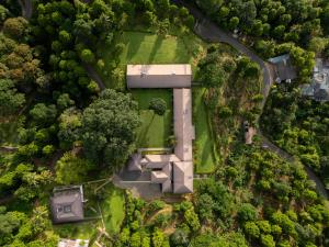 an aerial view of a house in the forest at Simpson's Forest - Luxury Boutique Resort & Spa - Kandy in Kandy