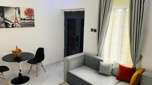 Posezení v ubytování WHITEFIELD LUXURY APARTMENT