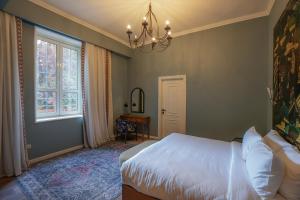 Posteľ alebo postele v izbe v ubytovaní Boutique Residence Villa Atouta-Lemon Spaces Maadi