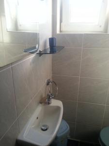 Kúpeľňa v ubytovaní Apartment Jevic