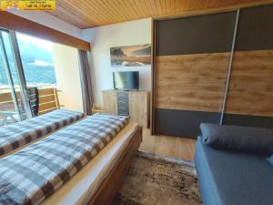 Rúm í herbergi á Apartment Salzkammergut