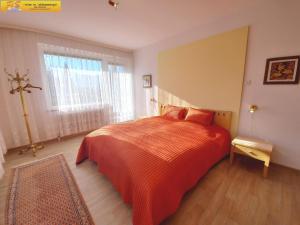 Posteľ alebo postele v izbe v ubytovaní Apartment Adam
