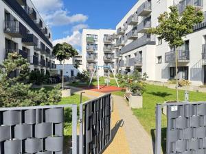 a view of an apartment complex from a balcony at Cozy Ozo apartments, free parking! in Vilnius