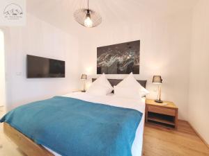 Postel nebo postele na pokoji v ubytování Penthouse Apartment Bergkristall
