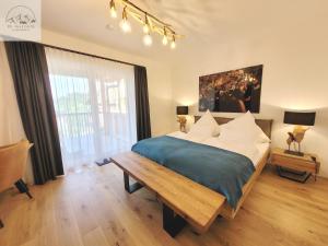 Rúm í herbergi á Penthouse Apartment Bergkristall