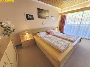 Postel nebo postele na pokoji v ubytování Apartment Almkogel
