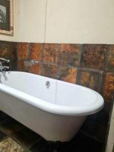 Ένα μπάνιο στο Point Village Accommodation -Linky's House +14 φωτογραφίες